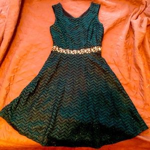 Girl’s size 16 holiday dress. Worn once. Glittery with rhinestones. Sea Green.